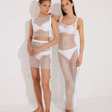 "Models posing in Alejandra Top and  Skirt from the front, highlighting the shimmering rhinestones and adjustable ties."
