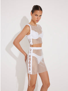 Front View: Model in Alejandra White Skirt - MOEVA Luxury Swimwear, Thigh Length , High Rise, Close Fit, MOEVA Luxury Swimwear