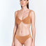 Front View: Model in Alexa Shiny Orange Bikini Top - MOEVA Luxury Swimwear, Underwired Top, V Neck, MOEVA Luxury Swimwear