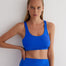 "Front view of a model wearing Alva Blue/Baby Blue Crop Top, showcasing the scoop neckline and sleek fit."