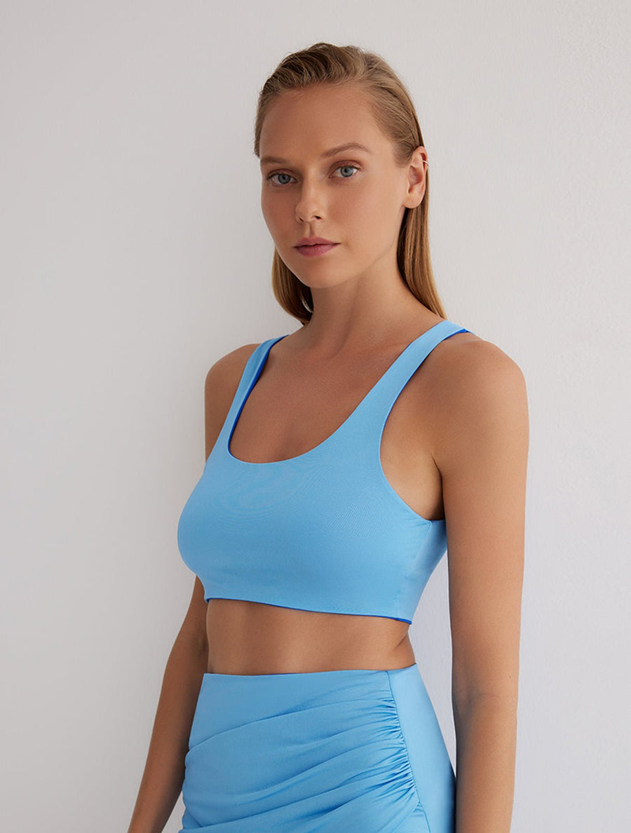 Front View: Model in Alva Blue/Baby Blue Reversible Top - 2 in 1 Reversible Top, Suitable for Swimming, UV Protection, MOEVA Luxury Swimwear