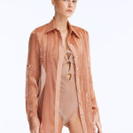Front View: Model in Ambrosia Bronze Shirt - Chic and Versatile Shirt, Long Sleeves, Soft Touch Shiny Fabric, Gold Wavy Buttons, MOEVA Luxury Beachwear