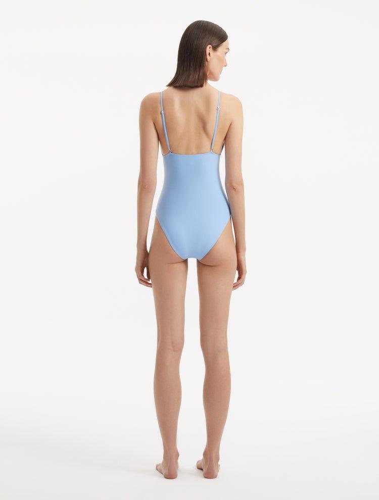 Rear view of the Anahita Baby Blue Swimsuit, highlighting adjustable straps and sleek design.