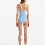 Rear view of the Anahita Baby Blue Swimsuit, highlighting adjustable straps and sleek design.