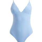  Artistic decoupage of the Anahita Baby Blue Swimsuit, highlighting its serene and sophisticated design.