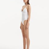 Side profile of the Anahita Swimsuit, showcasing the underwire support and elegant design.