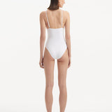 Rear view of the Anahita White Swimsuit, highlighting adjustable straps and sleek silhouette.