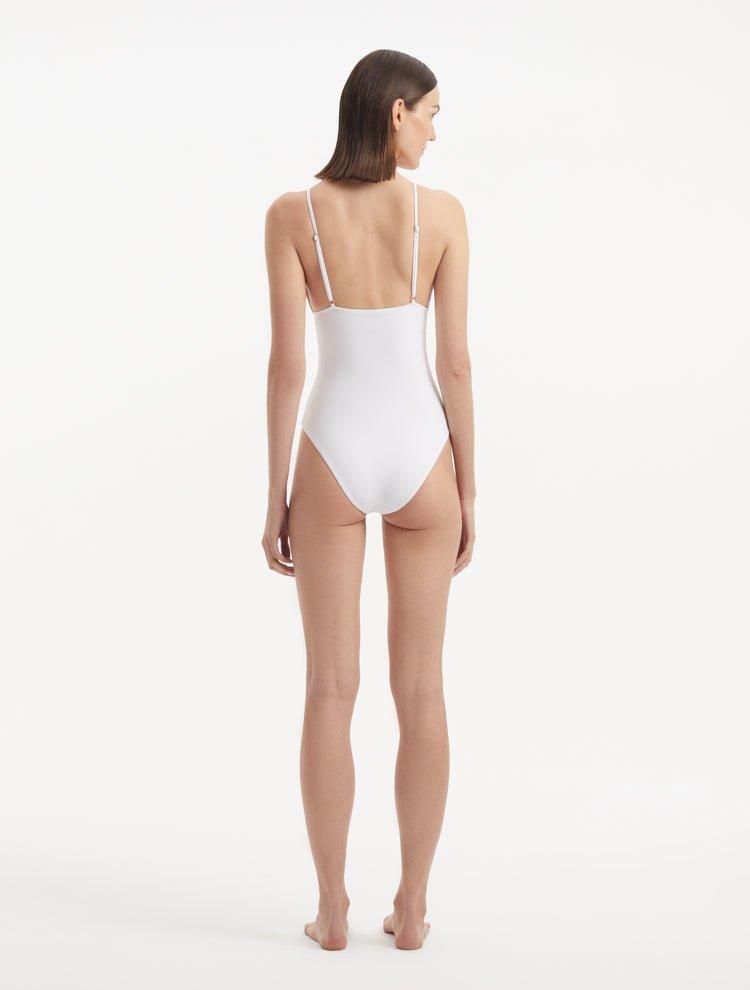 Rear view of the Anahita White Swimsuit, highlighting adjustable straps and sleek silhouette.