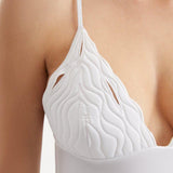 Detailed image of the Anahita Swimsuit, focusing on the intricate texture and premium Italian fabric.