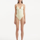 Anahita Yellow Swimsuit with a wavy textured top and vibrant yellow hue.