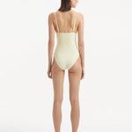 Rear view of the Anahita Swimsuit, featuring adjustable straps and sleek silhouette.