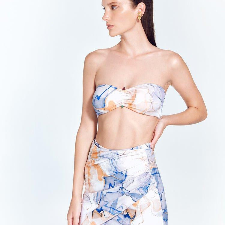 Antonia Blue Abstract High-Waist Wrap Mini Skirt | Moeva | Skirt | Each week unveils new pieces—luxury swimwear, fluid resort silhouettes, and elevated summer-to-evening essentials designed to carry you from coastal escapes to city nights.