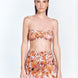 Front View: Model in Antonia Floral Abstract Skirt - MOEVA Luxury Swimwear, Wrap Style, Slim Fit, High Rise, Thigh Length Skirt, MOEVA Luxury Swimwear