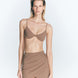 Front View: Model in Antonia Nude Skirt - MOEVA Luxury Swimwear, Wrap Style, Slim Fit, High Rise, Thigh Length Skirt, MOEVA Luxury Swimwear