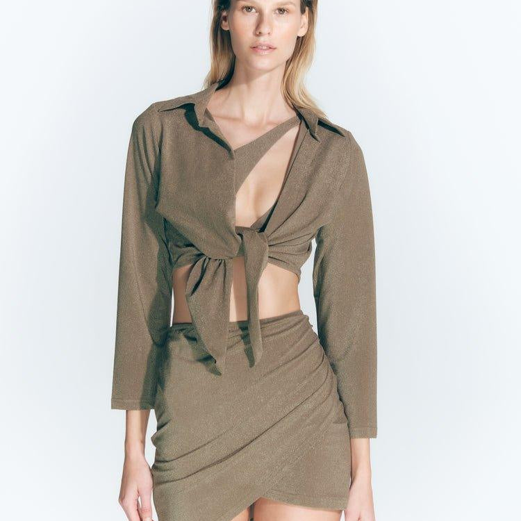 Antonia Shiny Green High-Waist Wrap Mini Skirt | Moeva | Skirt | Each week unveils new pieces—luxury swimwear, fluid resort silhouettes, and elevated summer-to-evening essentials designed to carry you from coastal escapes to city nights.