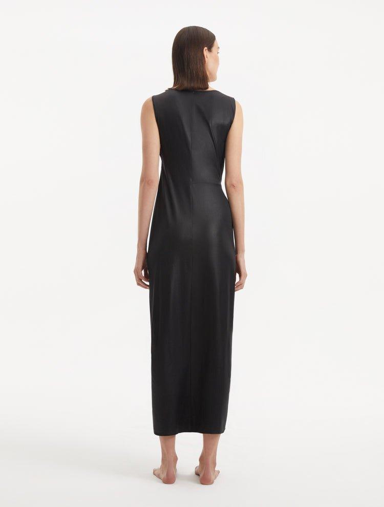 "Back view of the Apollo Black Dress, displaying the graceful ankle length and the smooth, flowing satin."