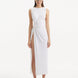 "Model showcasing the Apollo White Dress from the front, highlighting the elegant boat neckline, twist knot detail at the waist, and luxurious satin fabric."