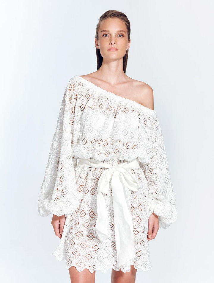 Front View: Model in Arlinda White Dress - Mini Dress, Unlined, Day to Night, Guipure Lace, Blouson Long Sleeves, MOEVA Luxury Swimwear
