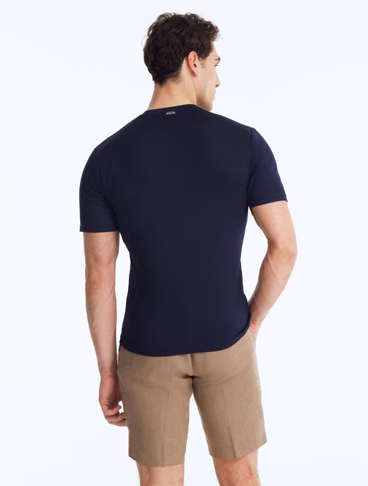 Back View: Model Wearing Atlas Dark Blue T-Shirt - Men's Dark Blue Cotton Tee, Unlined, MOEVA Luxury Swimwear