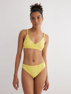 Front View: Model in Aya Yellow Bikini Bottom - MOEVA Luxury Swimwear, Classic Briefs, Fully Lined, Comfort, Soft Touch Fabric, MOEVA Luxury Swimwear