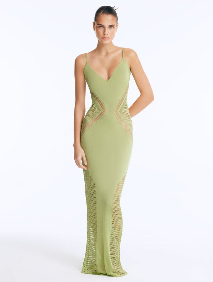 Front View: Model in Azalea Green Dress - Chic Maxi Dress, Knitted, Ankle Length, V Neckline, MOEVA Luxury Swimwear