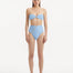 Baia Baby Blue Bikini Top front view, highlighting strapless bandeau design and gold shell accents.