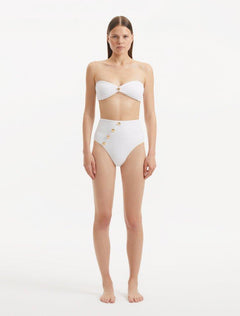 Front view of Baia White Bikini Bottom, showcasing high-waist design and gold button accents.