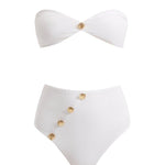 A detailed decoupage image of the Baia White Bikini Set, showcasing the strapless bandeau top with gold shell buttons, the sleek bikini bottom, and the luxe gold clasps, capturing the essence of elegance and high-end design.