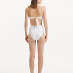 Back view of Baia White Bikini Top, highlighting golden clasps and secure fit.