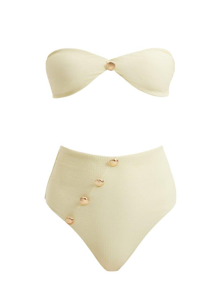 A detailed decoupage image of the Baia Yellow Bikini Set, showcasing the sun-kissed bandeau top with gold shell buttons, the sleek bikini bottom, and the luxe gold clasps, capturing the essence of radiant summer fashion.