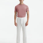 Front view of Baron Pink T-Shirt on model, highlighting the vibrant color and high-quality knit fabric.