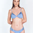  "Beatrice blue bikini top with underwire, adjustable straps, and gold clasps. Features a contrast of matte and satin fabrics on the cups, providing moderate coverage."