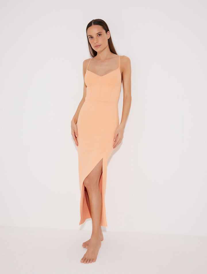 Front View: Model in Beau Orange Dress - MOEVA Luxury Swimwear, Knitted, Ankle Length, Close Fit, Stitching Details, Decorative Ribbed Details, Scoop Neck, MOEVA Luxury Swimwear