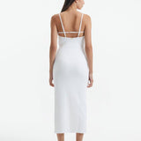 Back View: Model in Beau White Dress - MOEVA Luxury Swimwear, Low Back, Adjustable Straps with Metal Trims, Side Slit, Ready to Wear Maxi Dress, MOEVA Luxury Swimwear