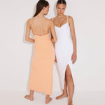 Front View: Model in Beau White Dress - MOEVA Luxury Swimwear, Sleeveless Knitted Maxi Dress, Ankle Length, Close Fit, Scoop Neck, MOEVA Luxury Swimwear