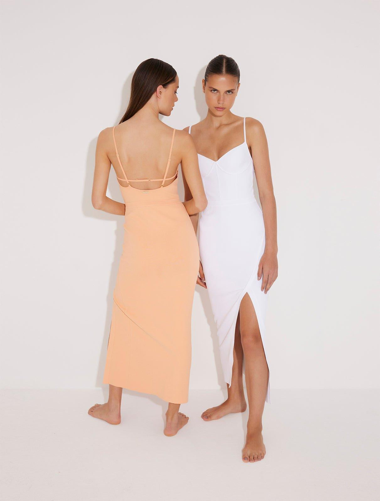 Front View: Model in Beau White Dress - MOEVA Luxury Swimwear, Sleeveless Knitted Maxi Dress, Ankle Length, Close Fit, Scoop Neck, MOEVA Luxury Swimwear