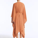 Back View: Bethany Bronze Kaftan on Model - Poncho Style Sleeve, Self-Tie Belt, Full Body Coverage, Made from 100% Silk Fabric, MOEVA Luxury Beachwear