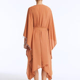 Back View: Bethany Bronze Kaftan on Model - Poncho Style Sleeve, Self-Tie Belt, Full Body Coverage, Made from 100% Silk Fabric, MOEVA Luxury Beachwear