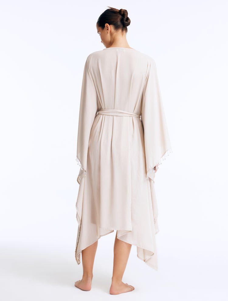 Back View: Bethany Silver Kaftan on Model - Poncho Style Sleeve, Self-Tie Belt, Full Body Coverage, Made from 100% Silk Fabric, MOEVA Luxury Beachwear