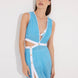 "Model wearing Blanca Blue/White Asymmetrical Dress with gold button accents."