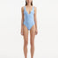 Front view of Breena Baby Blue Swimsuit, showcasing wavy texture and elegant V-neck design.