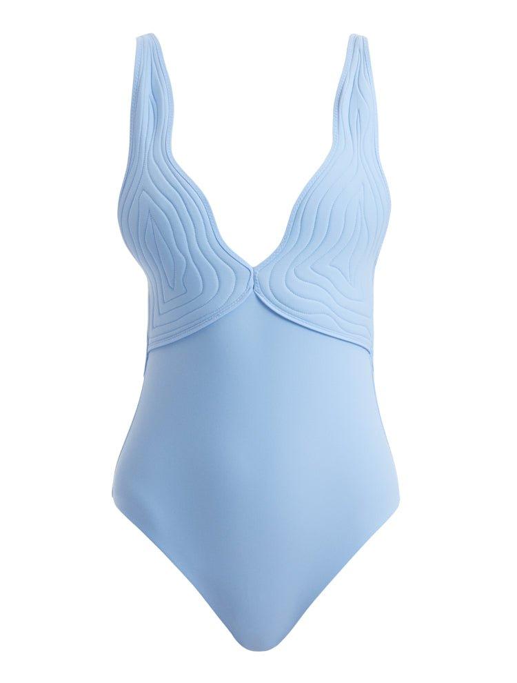 Artistic decoupage of Breena Baby Blue Swimsuit, blending serene blue tones with intricate gold accents.