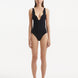 Front view of Breena Black Swimsuit, showcasing textured wave detail and elegant V-neck design.