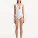 Front view of Breena White Swimsuit, showcasing wavy textured detail and V-neck design.