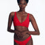 "Front view of the Brenda Bikini Bottom with chic V-cut and button details on a model."