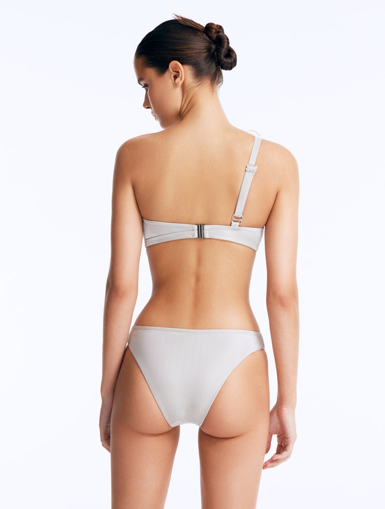 Back View: Calix Silver Bikini Bottom on Model - Stylish Two-Piece Swimsuit Bottom, Full Bottom Coverage, Italian Fabric, MOEVA Luxury Swimwear