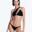 "Front view of the Carol Seersucker Black Bikini Bottom, highlighting its low-rise silhouette and thin elasticated strap with small coverage."