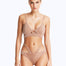 Front View: Model in Cassia Bronze Bikini Top - Scoop Neck, Metallic Fabric, Clear Glass Drop Shaped Accessory, Topstitching Details, Gold Clasps, MOEVA Luxury Swimwear