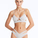 Front View: Model Wearing Cassia Silver Bikini Set- Low Waist Briefs, Chic and Accessorized, Metallic Fabric, MOEVA Luxury Swimwear