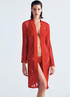 "Front view of the Chantel Red Kaftan displaying its knee-length hemline, long sleeves, and front-tie belt. "